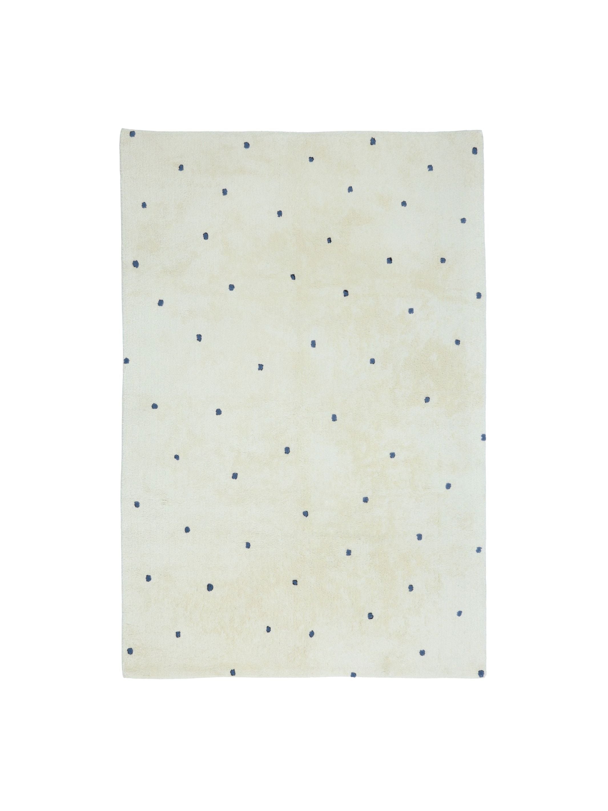 Natural rug with dusty blue polka dots on a white background