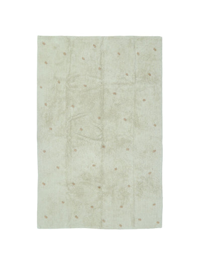 Natural rug with dusty coral dot details