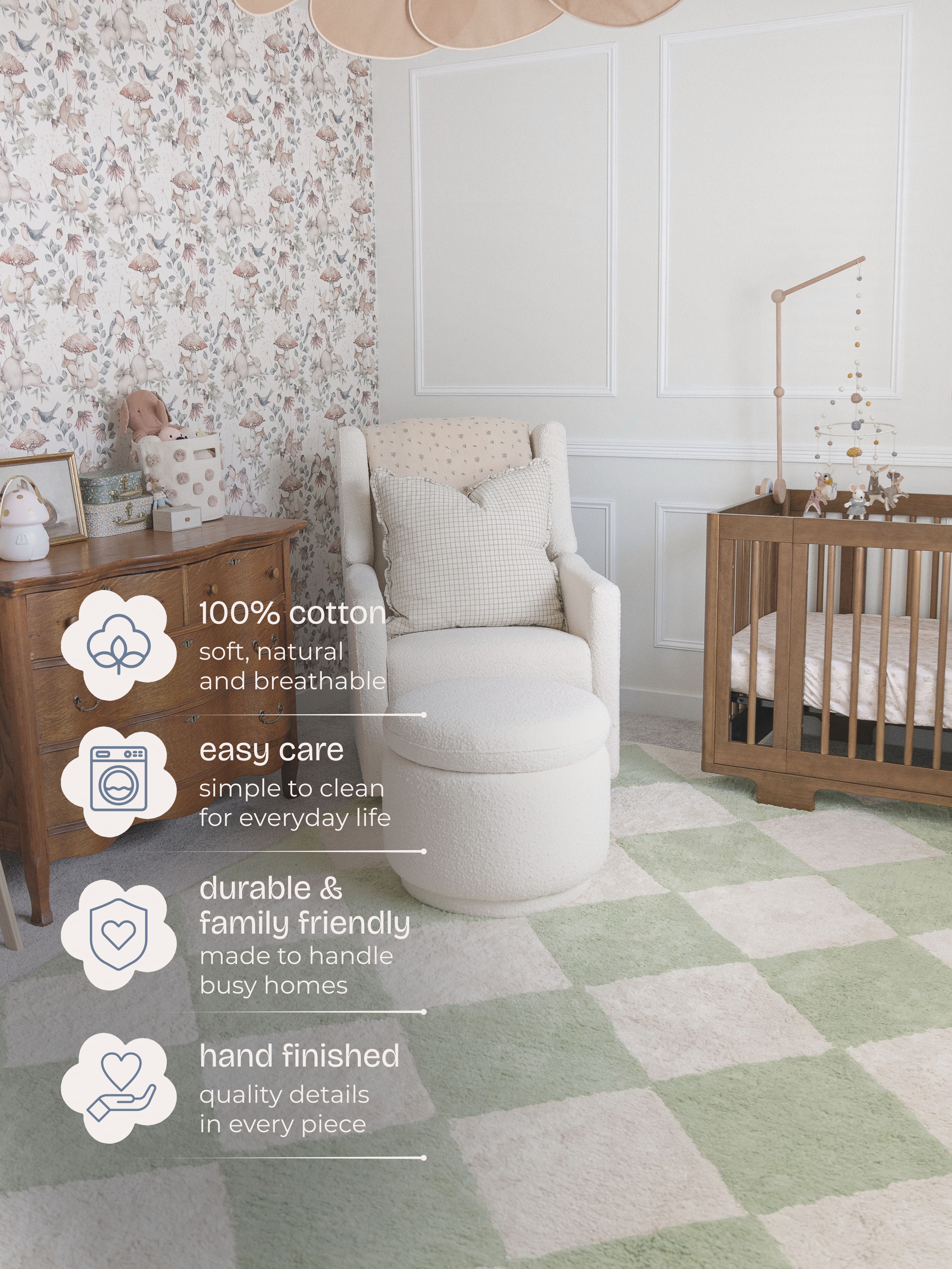 Nursery room with a rocking chair, crib, and decorative elements.